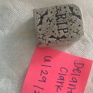 Nora Fleming retired tombstone